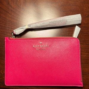 Kate Spade, beautiful pink wristlet, brand new with tags and wrapping’s